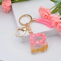 cute jewelry ornament resin material with tassel alphabet key chain glitter keyring letter keychain bag pendant