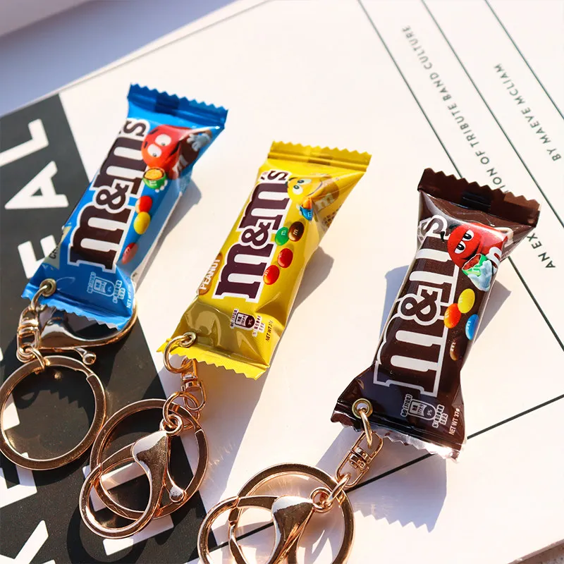 Фото Брелоки M&M's! Серия «Веселые имитации закусок»: синие, желтые и коричневые, подвески для рюкзаков, маленькие аксессуары №1