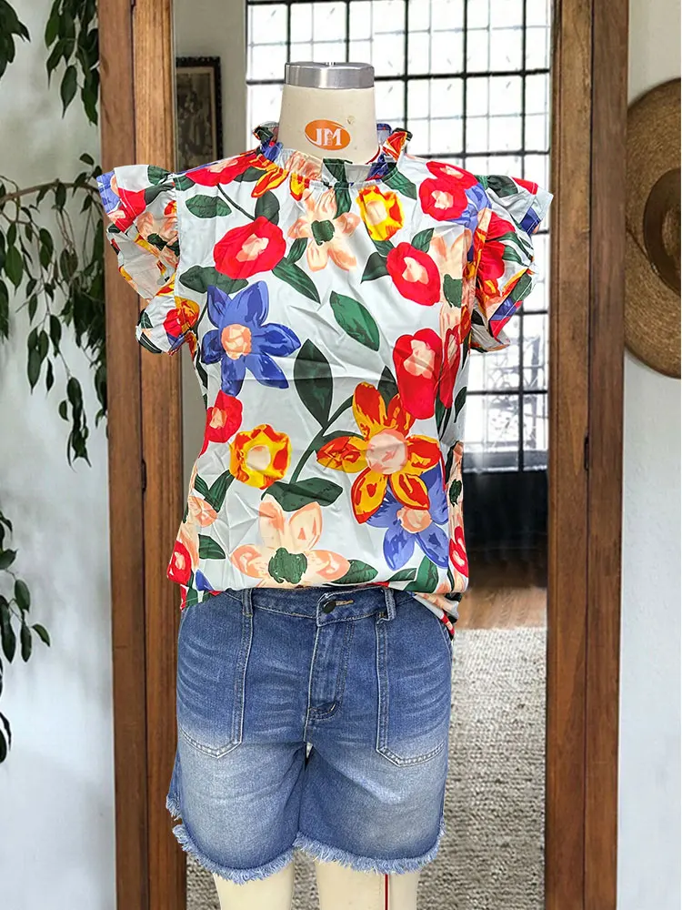 Разноцветная блузка с цветочным принтом и рюшами на рукавах многоуровневая