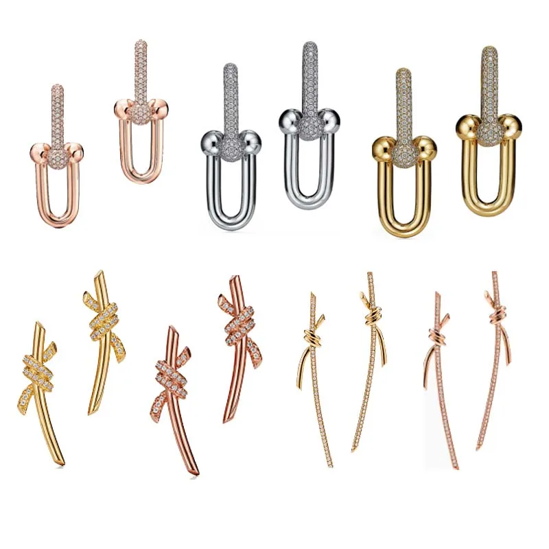 

Серьги-гвоздики из серебра 925 пробы с логотипом Witrh