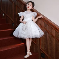 summer childrens wedding dress flower girl elegant regal white princess style model catwalk host piano performance