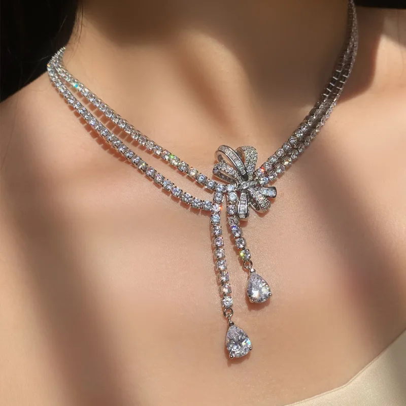 

Light Luxury Temperament Necklace for Women Flower Bow Zircon Necklace Earring Set Simple Wedding Dress Accessories Jewelry Set