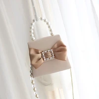 new bowknot versatile handbag elegant pearl tote fashionable solid color chain shoulder pu leather messenger bag for women