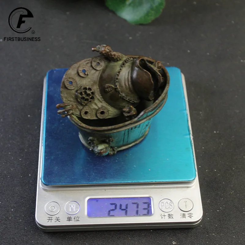 

Медная статуэтка лягушки