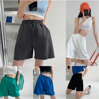 women casual sports shorts solid color elastic waist wide leg shorts with pockets running shorts straight streetwear tracksuit