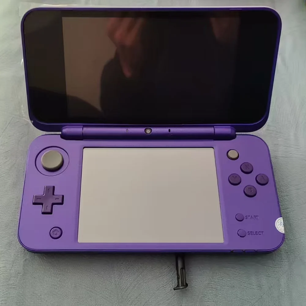 Фото Новая мобильная игровая консоль 2DS XL/LL в стиле ретро с оригинальной восстановленной разблокированной IPS-экраном ФБР — новые бесплатные игры 2DS XL/LL №1