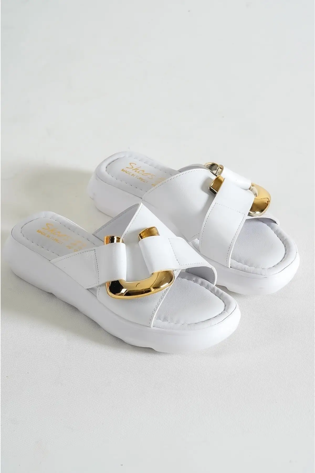 

Women white brella buckle detailed soft sole slippers