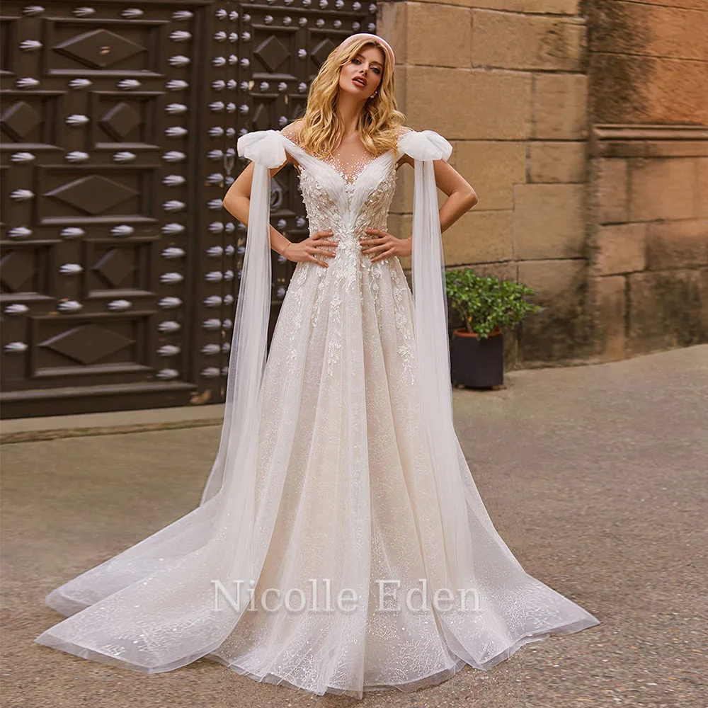 

Летнее свадебное платье с бантом и кристаллами