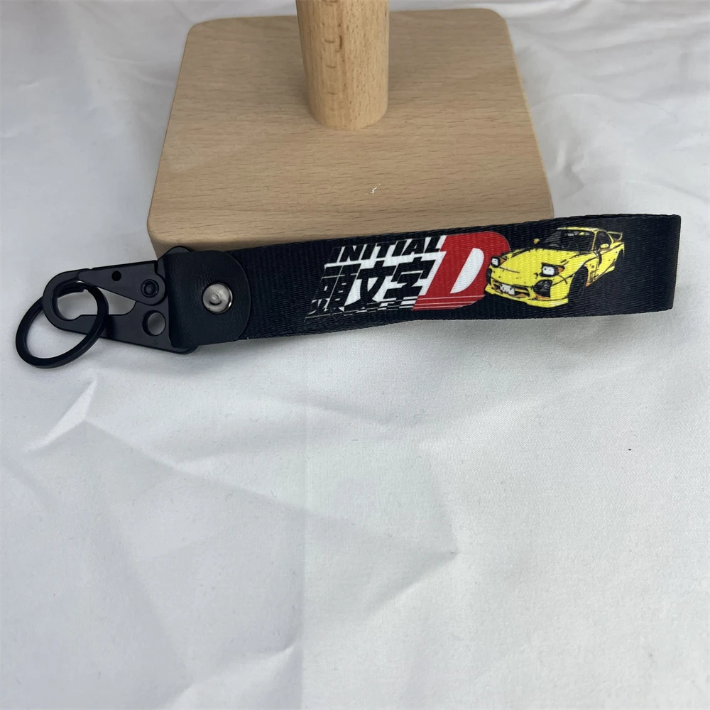

Car Keychain Logo Classic Anime Cartoon Emblem Black Fabric Alloy Key Ring For Initial D Yellow Mazda RX7 FC3S JDM Accessories