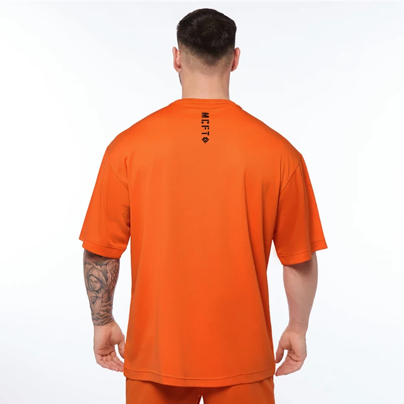 

Быстросохнущая Сетчатая футболка большого размера, мужская летняя спортивная футболка с короткими рукавами и спущенными плечами, Мужская свободная футболка для фитнеса в стиле хип-хоп