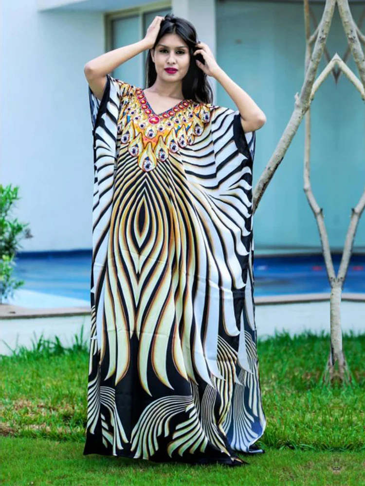 

Пляжное платье-макси с V-образным вырезом и принтом