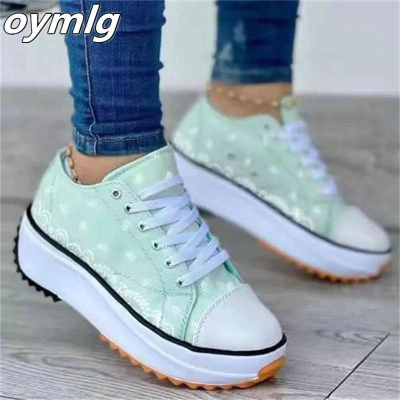 

2022 spring new low-top thick-soled printed canvas sponge cake bottom large size casual women's single shoes spot