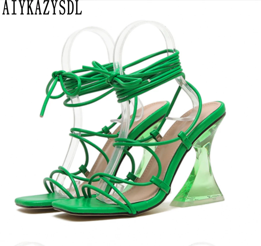 

AIYKAZYSDL Cross Strap Hollow Cut Out Shoes Gladiator Sandals Strange Clear High Heel Women Ankle Strap Strappy Heels Woman 2022