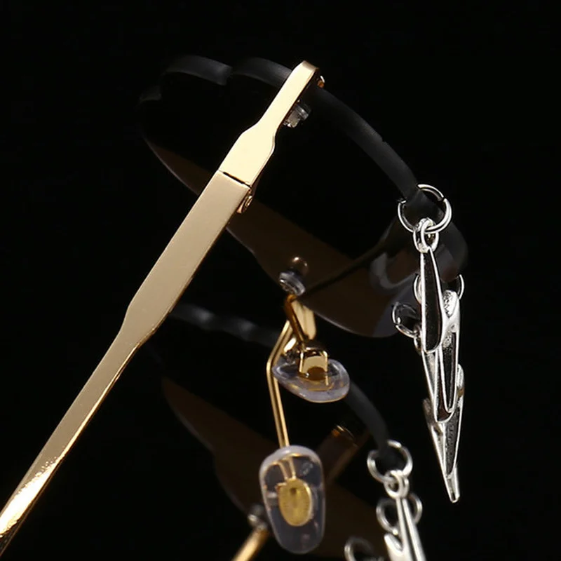 Модные солнцезащитные очки UV400 с кисточками модные без оправы в стиле ретро