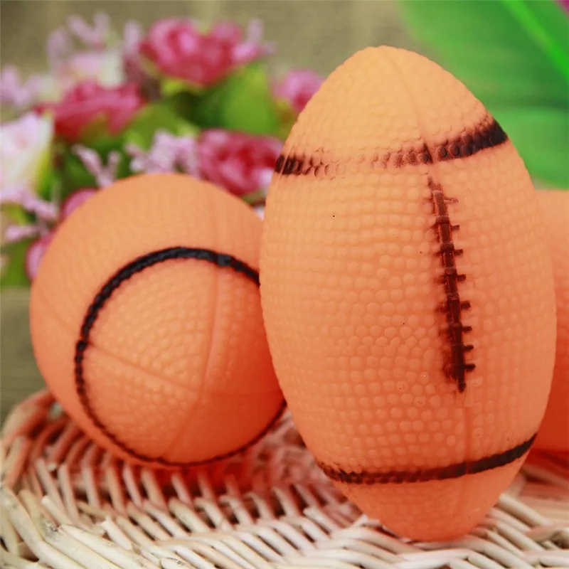 

Pet Dogs Toys Sounding Chewing Squeaky Toy for Dogs Puppies Football Soccer Dogs Ball Training Rugby 1pc Wholesale Funny Toys