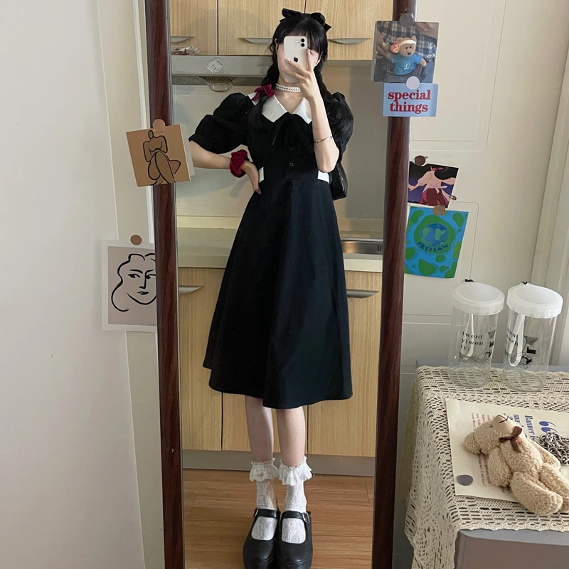

Hepburn style French temperament bubble sleeve black dress women's summer 2022 new doll collar waist skirt fashion