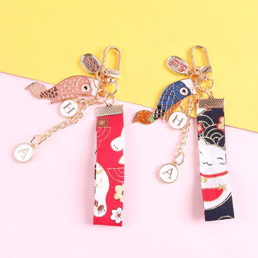 Cute Anime Carp Streamer Keychain Ladies Metal Lucky Mobile Phone Pendant Car Bag Pendant Bluetooth Earphone Box Pendant