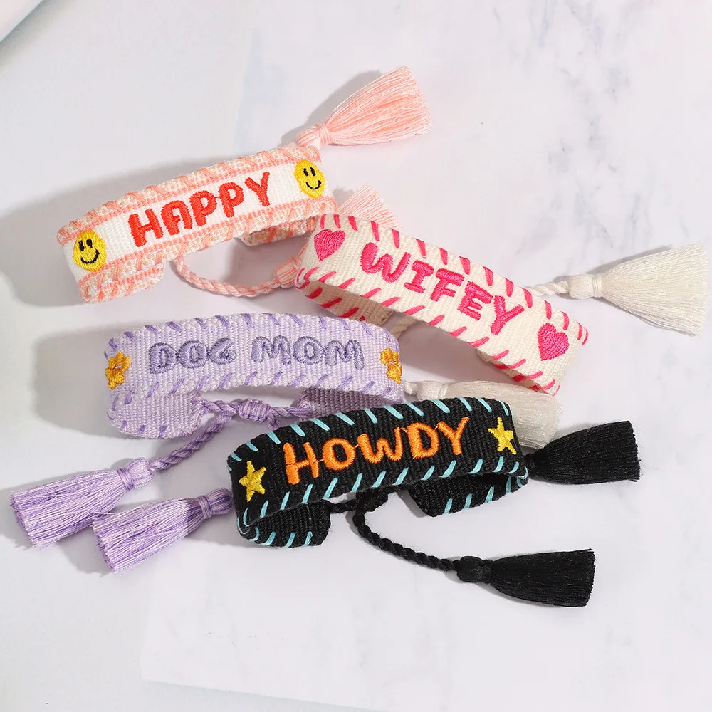 

Bohemia Embroidery Four-Leaf Lucky Letter Bracelet For Women Hand Woven Tassel Adjustable Hand Rope Fashion Jewelry Wholesale
