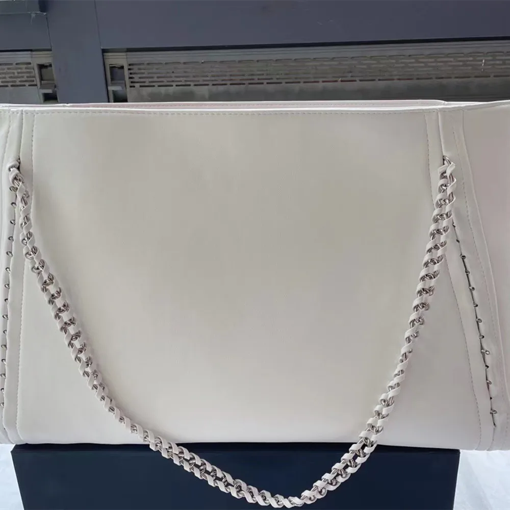 

Light luxury women's bag 2022 new high-end shopping bag simple solid color with braided hardware chain shoulder strap low-key lu