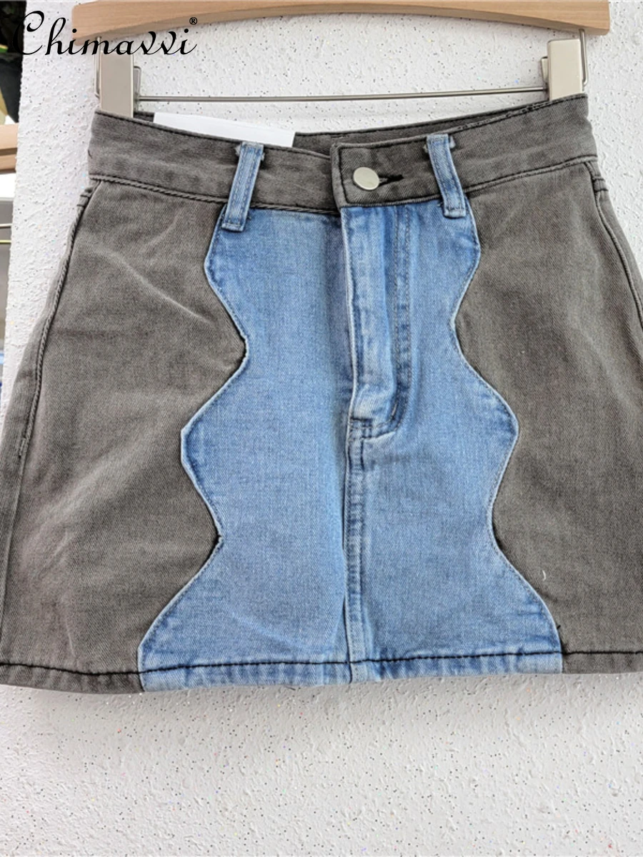 

European 2022 Summer Fashion Simple Irregular Stitching Denim Skirt Women's New Loose Elegant Patchwork Above Knee Hip Skirt