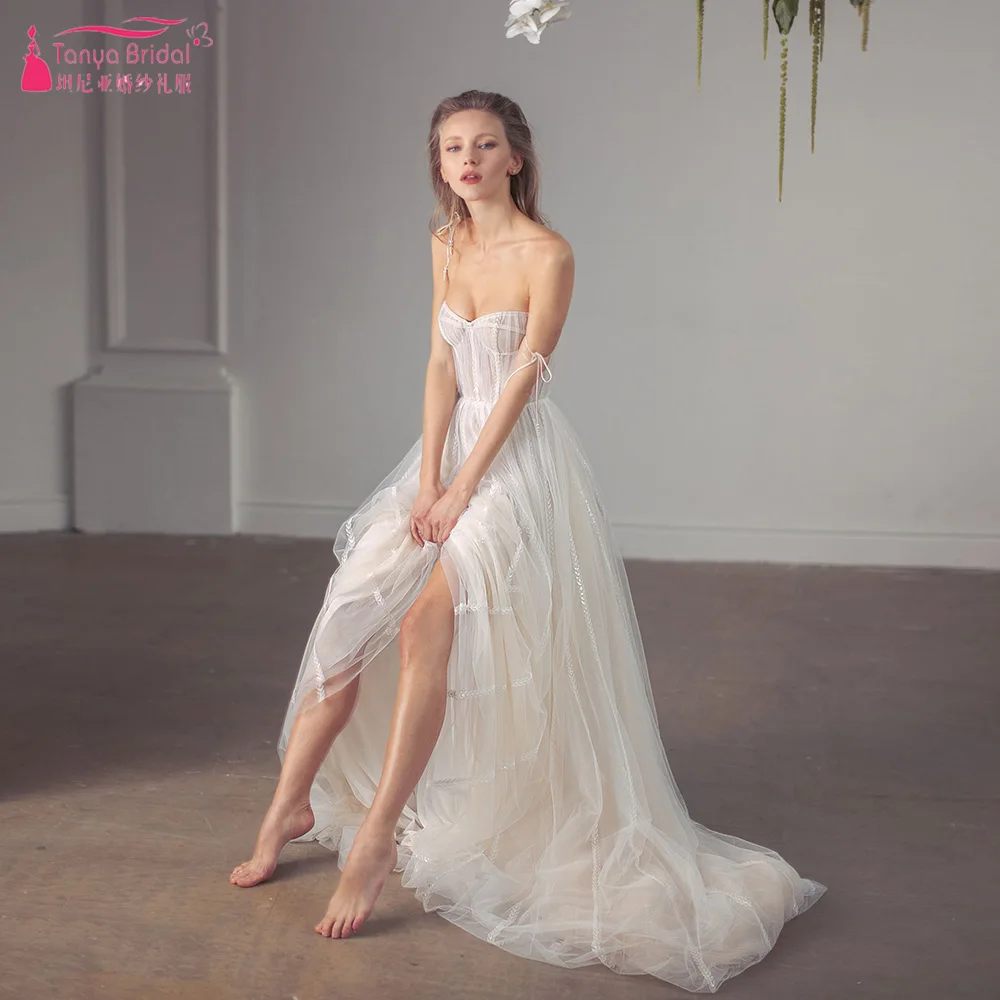 

Свадебное платье из тюля в стиле бохо, а-силуэт, модные пляжные свадебные платья с роскошными кружевными линиями, шикарные платья ZW719