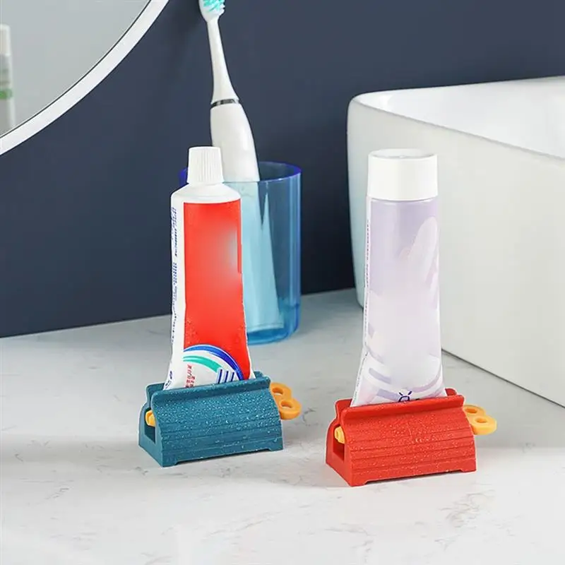 

Toothpaste Dispenser Squeezer Plastic Cream Tube Squeezing Dispenser Toothpaste Seat Holder Organizer Bathroom Accessories