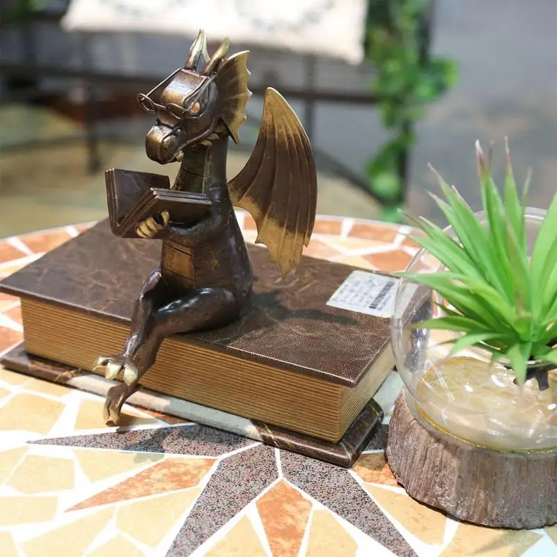 

Dragon Reading Book Statue Garden Dinosaur Figurines Art Resin Sculpture Outdoor Garden Decor Home Desk Ornament Collectible