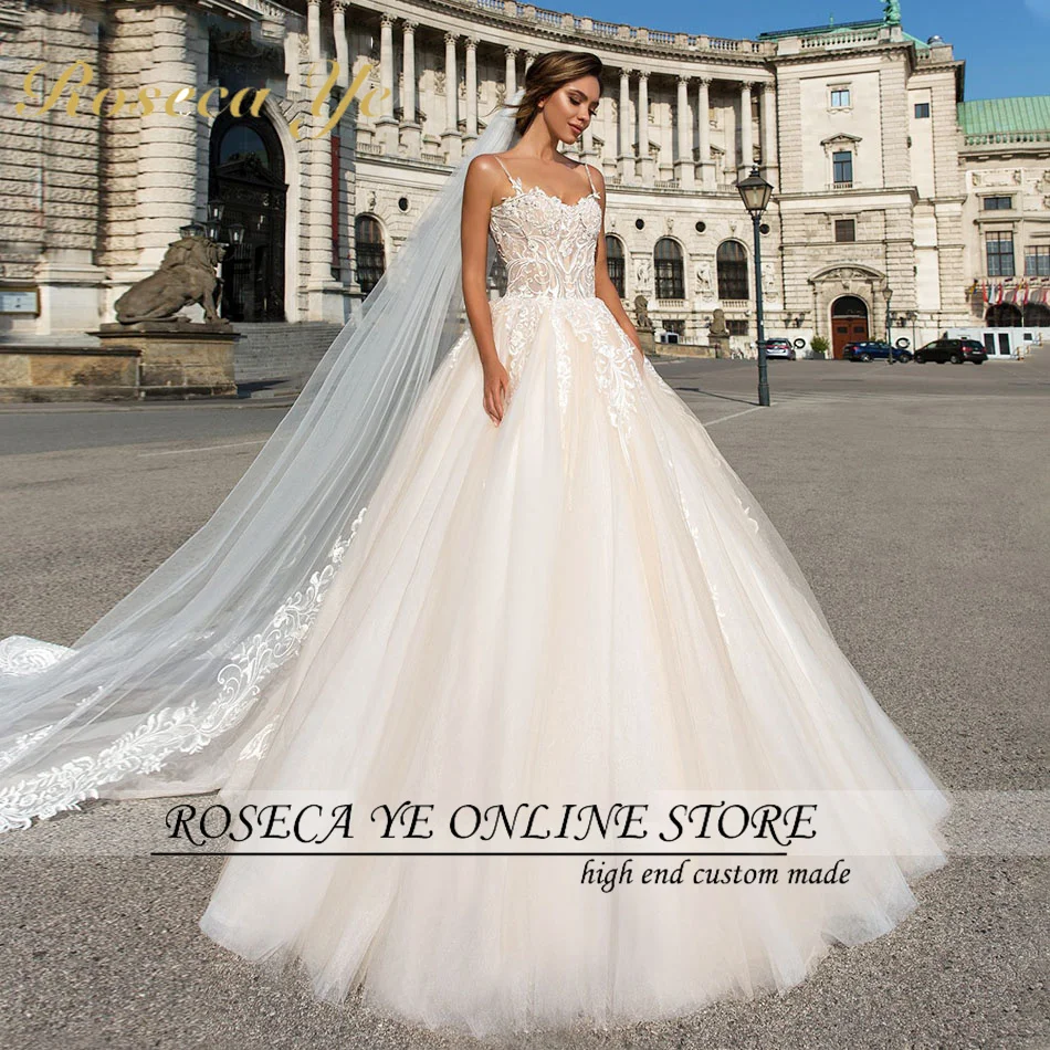 

Roseca Ye A-Line Wedding Dress 2022 Charming Strapless Beading Appliques Bride Spaghetti Straps Backless Princess Bridal Gown