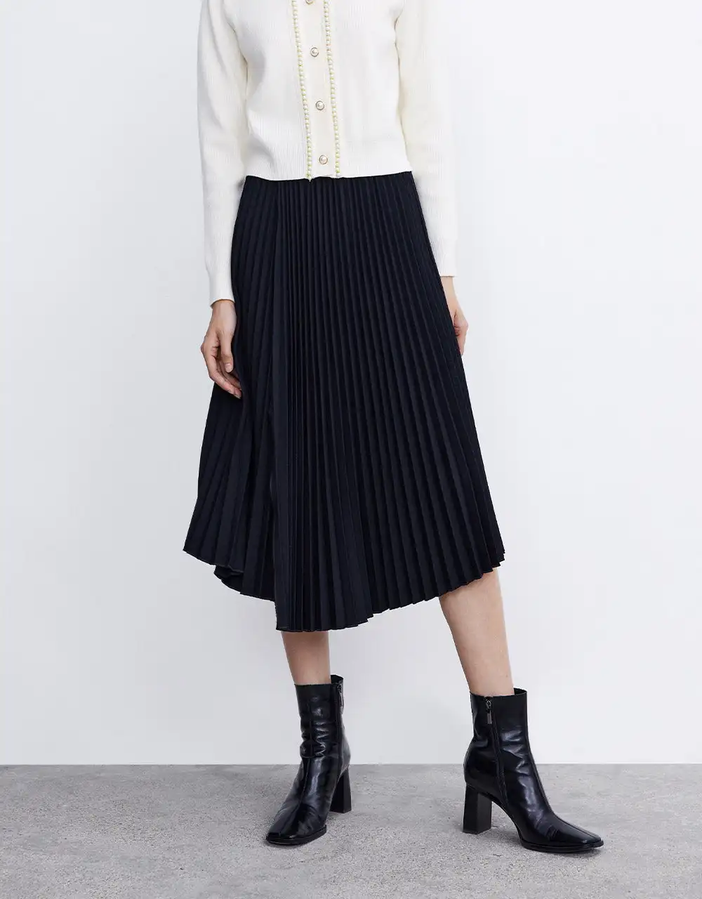 

Pleated Asymmetrical Hem Midi Skirt