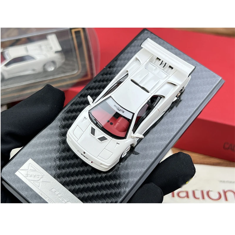 

Новинка, товар в наличии, модель автомобиля из модифицированной смолы белого цвета с погрешностью 404 Ламбо Диабло 1/64, в декабре 2022 года