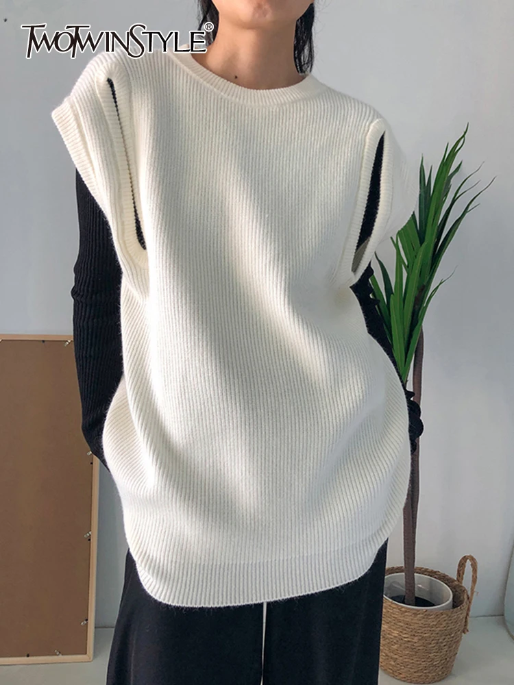 

TWOTWINSTYLE Solid Casual Sweaters For Women Round Neck Sleeveless Hollow Out Loose Knitting Sweater Female Fashion Clothing New