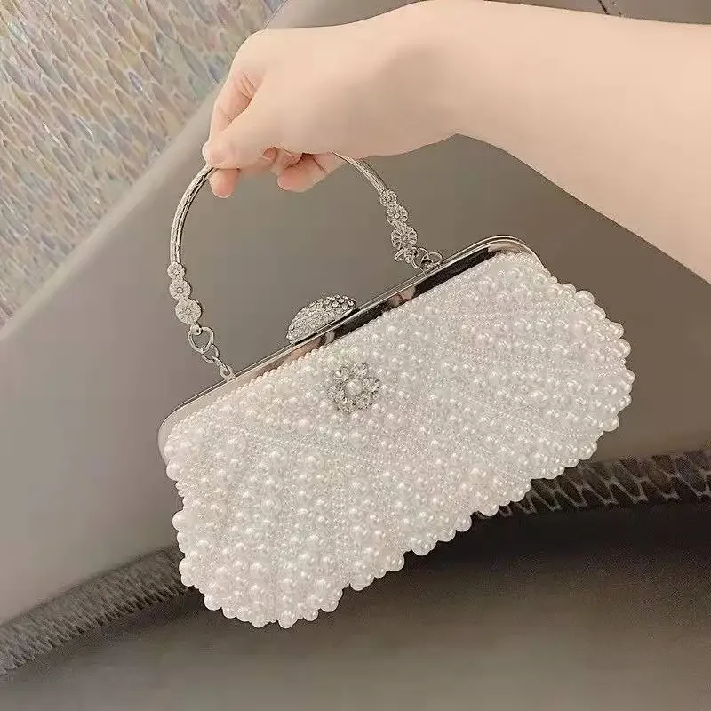 

Europe and the United States women hand temperament pearl dinner bag lady banquet commuting fashion socialite party bag