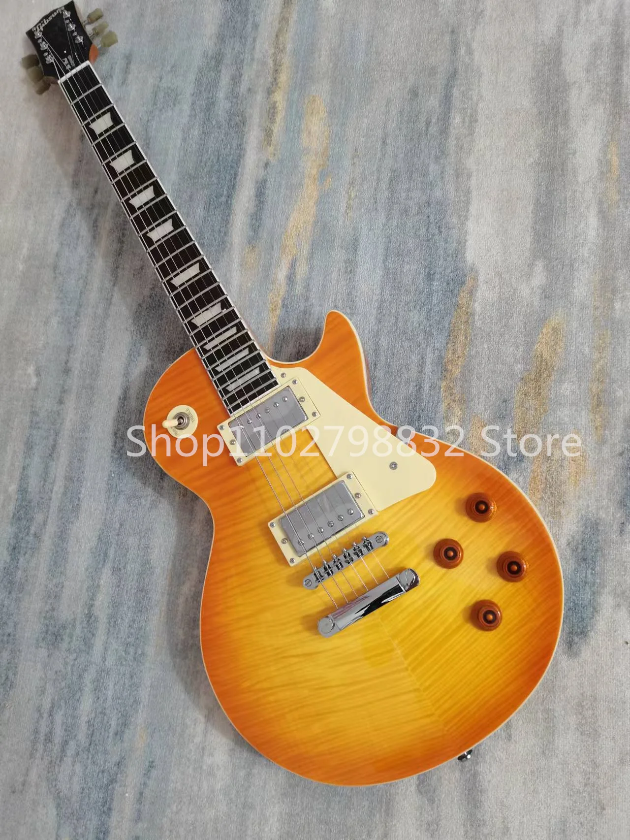 

6-string electric guitar, Tiger surface, silver accessories, mahogany fingerboard, free transportation