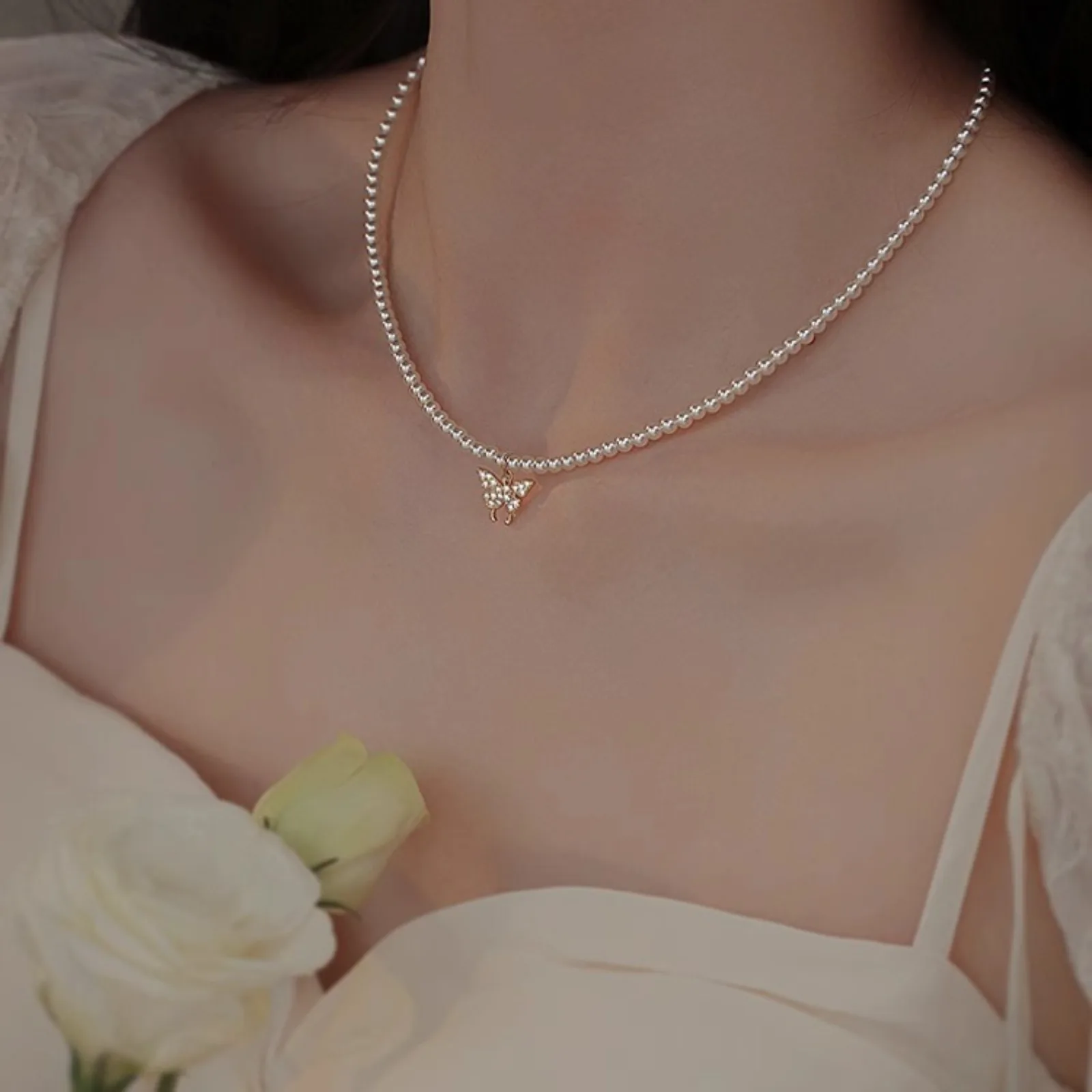 Серебряное ожерелье-бабочка с жемчужной цепочкой