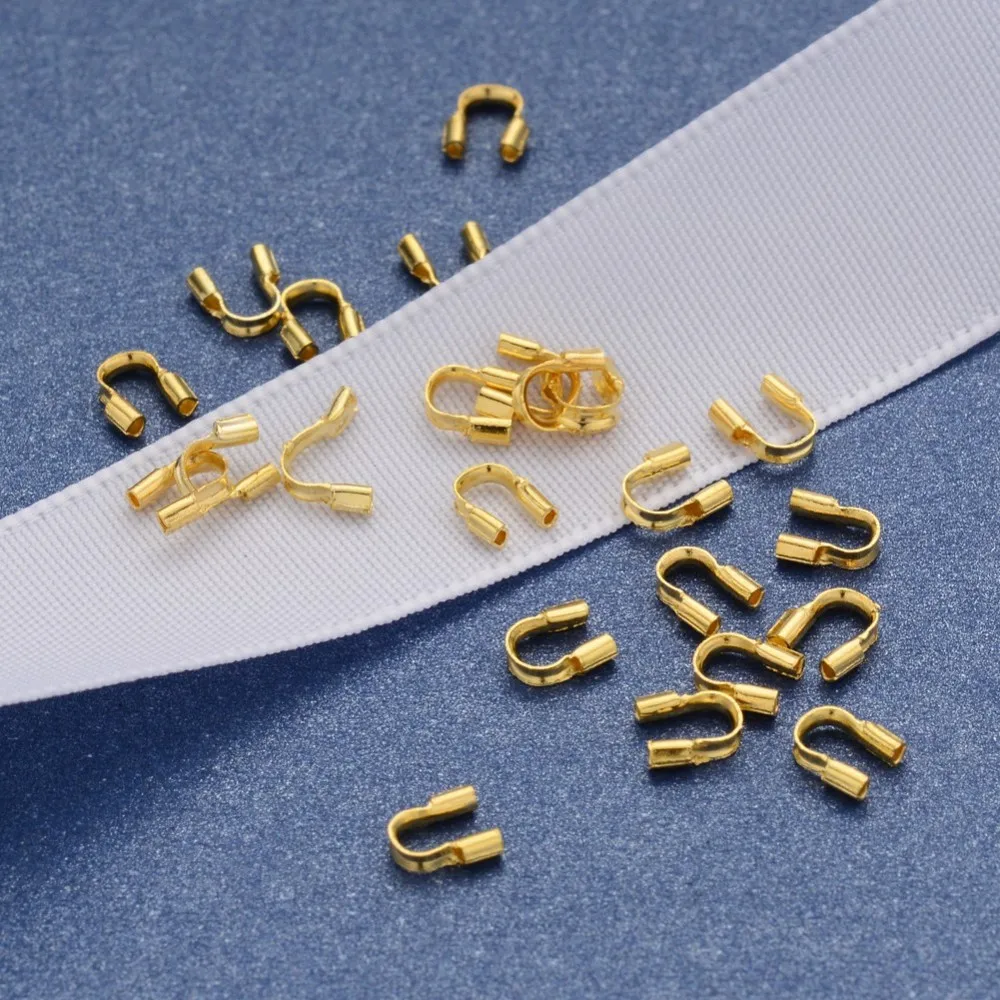 

100pc Brass Wire Guardian and Protectors Golden Metal Color about 4mm wide 5mm long 1mm thick Hole: 0.5mm