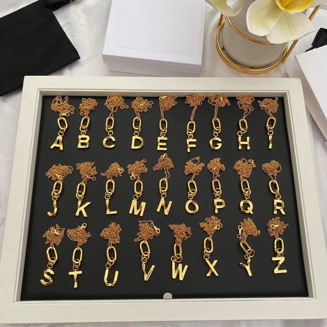 

European and American popular 26 letter button necklace, earrings set