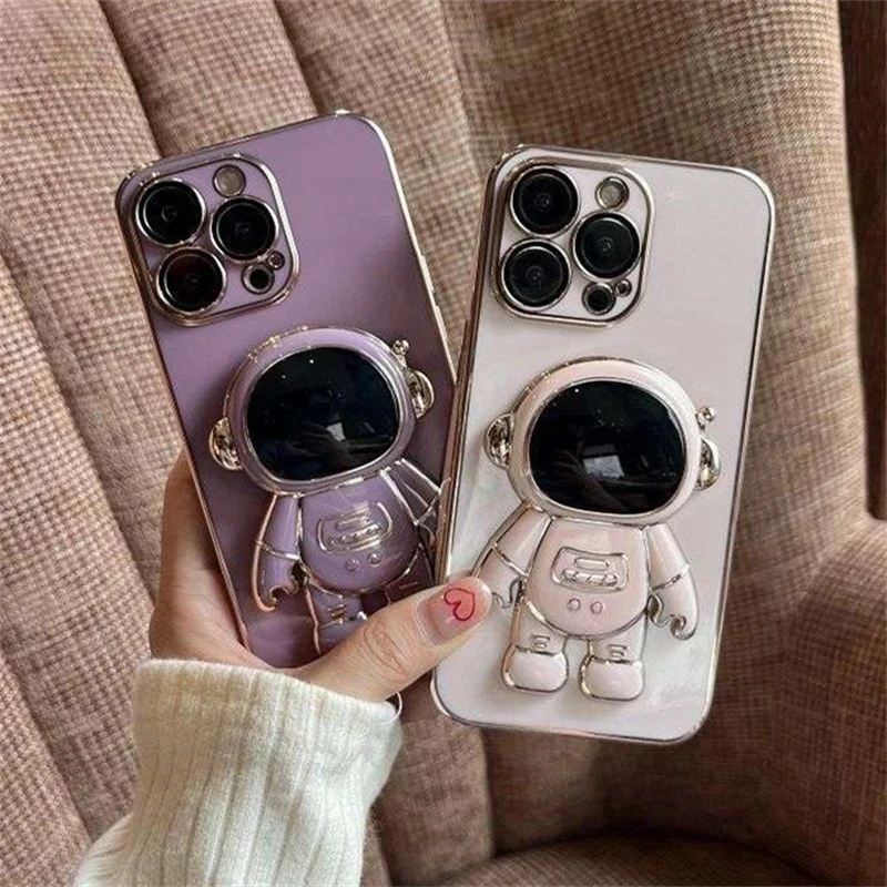 

Electroplated astronaut folding stand case For iphone 12 13 Mini 11 14 Pro XS Max XR 7 Plus lens Camera protector silicone cover