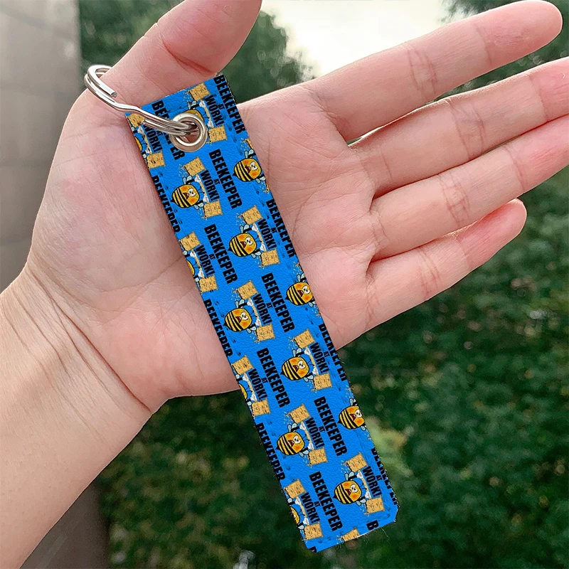 

Fashion Beekeeper At Work leather motorcycle Key chain Strap Key rings Hanging Holder Bag Wallet Trinket Keychain Hanging Bag