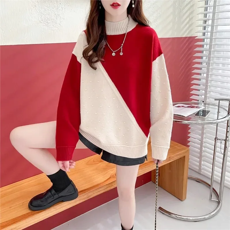 Женский трикотажный пуловер в горошек с длинным рукавом