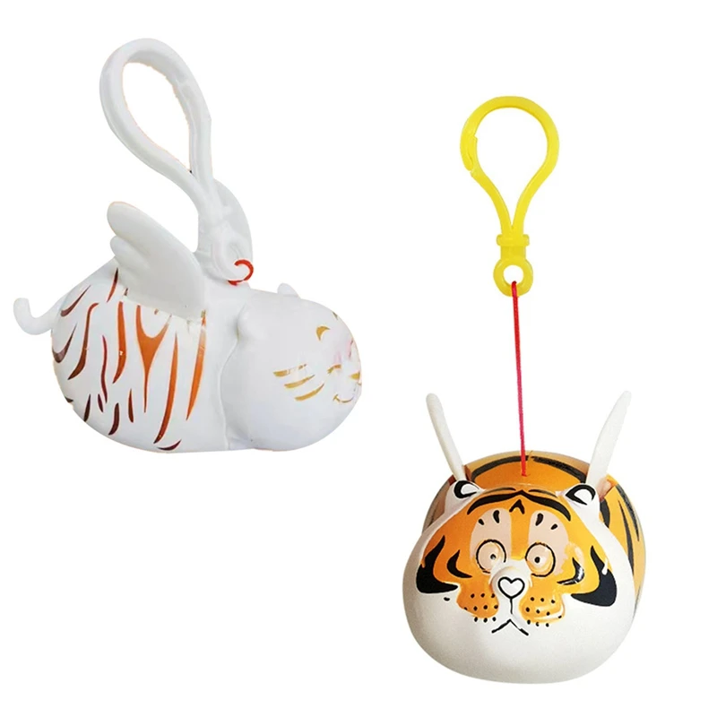 

Брелок для ключей с крыльями тигра