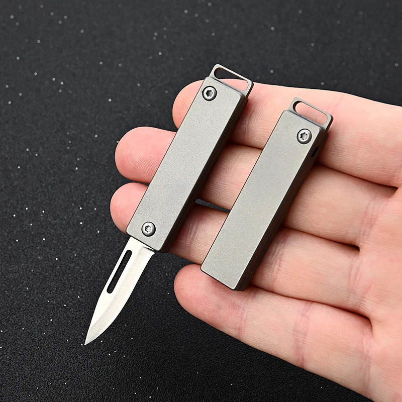 

Titanium Alloy Mini Folding Knife High Hardness D2 Steel Sharp Knife With Keychain Pendant Disassembly Express Open Box EDC Tool