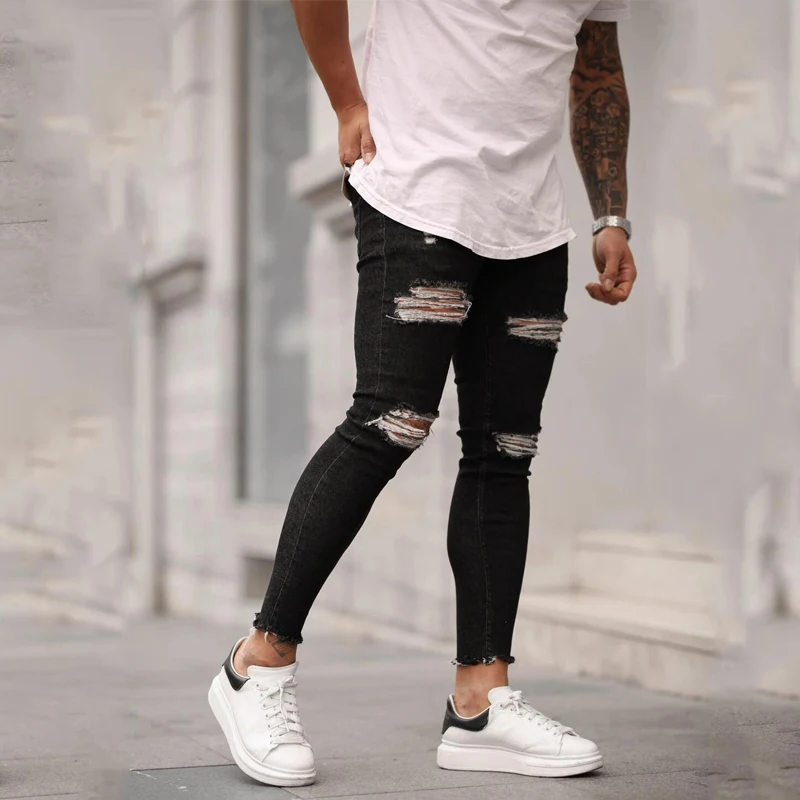European and American new men's ripped elastic skinny skinny jeans torn nine-point jeans Youth fashion trend casual trousers