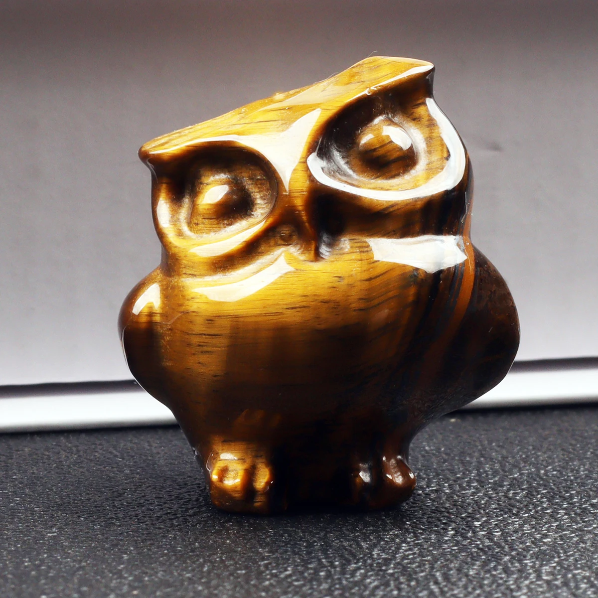 

Фигурка совы из тигрового глаза