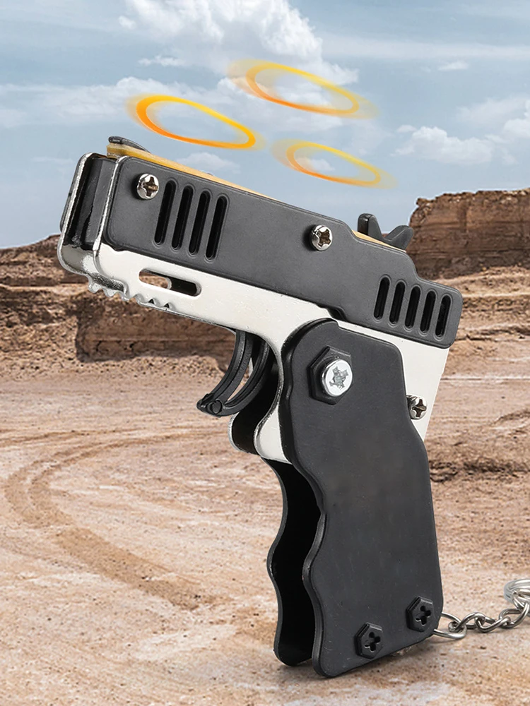 

Пусковое устройство с резиновой лентой, складной брелок с пистолетом, ручной пистолет, мини-брелок из нержавеющей стали, игрушка для стрель...