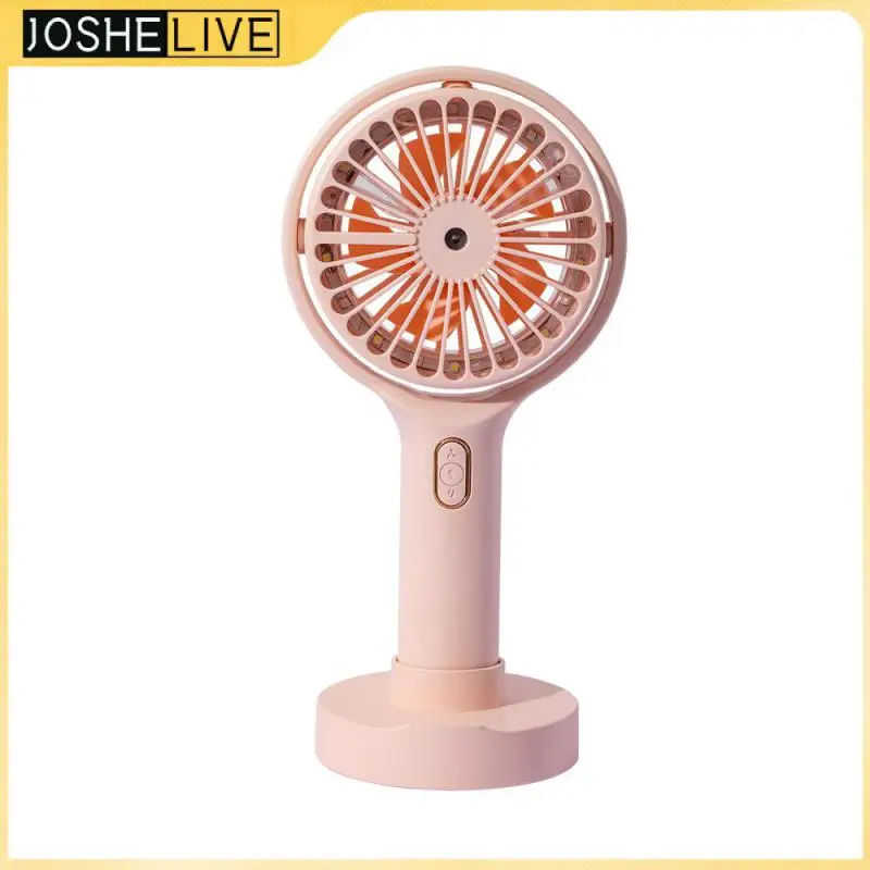 

Summer Cooler Mini Handheld Fan USB Charging Multi-function Fan Desktop Handheld Fan Cooling Air Conditioner Humidifier Outdoor