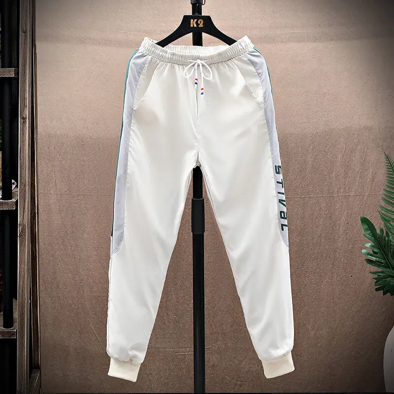 

2022 г., Свободные повседневные брюки большого размера в гонконгском стиле, мужские спортивные брюки, весенние ледяные шелковые Слаксы до щик...