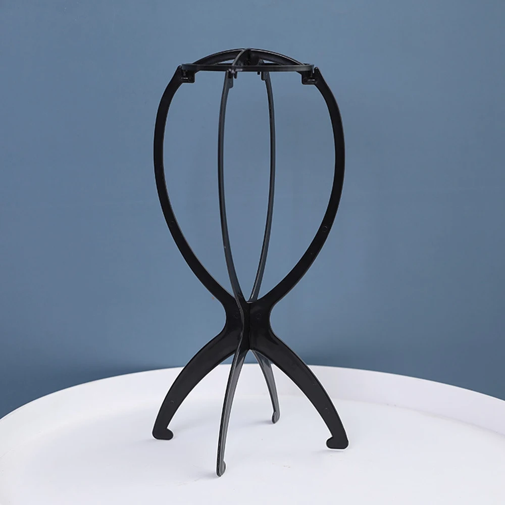 

Пластиковая регулируемая подставка для парика черный/розовый