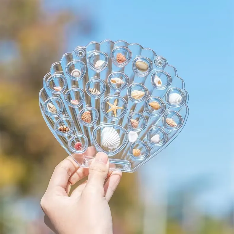 

Акриловая коробка-ракушка для хранения украшений