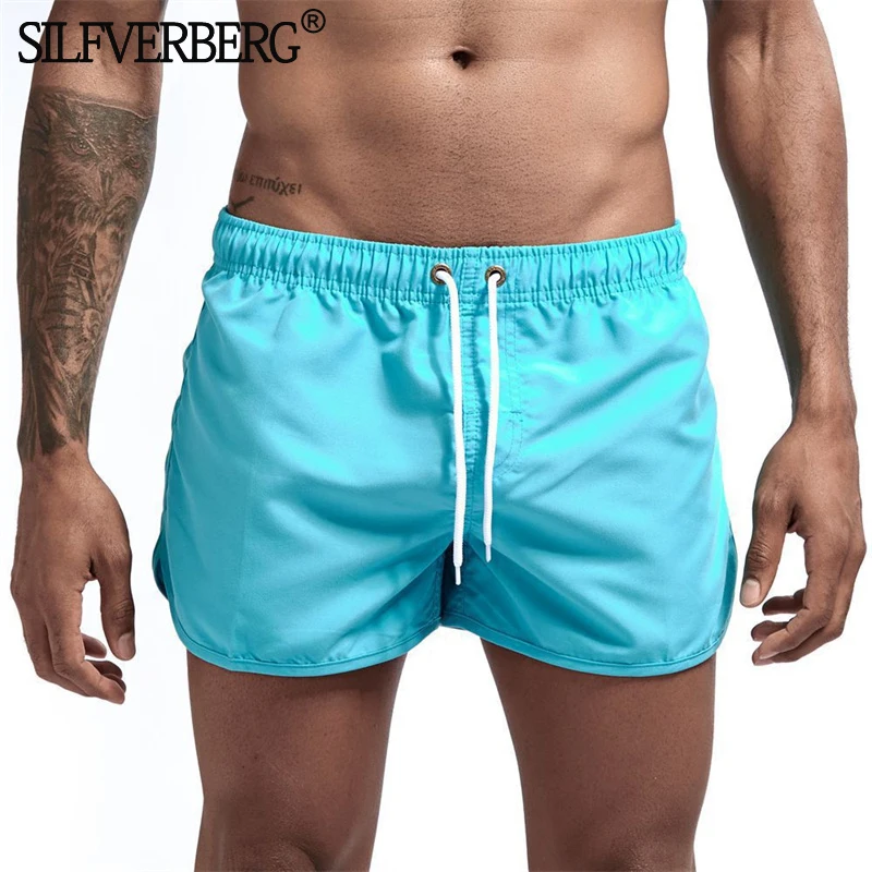 

Men Summer Quick Dry Mid Waist Beach Shorts Loose Adjustable Elastic Casual Fitness Short Pants Breathable Boardshorts Oversize