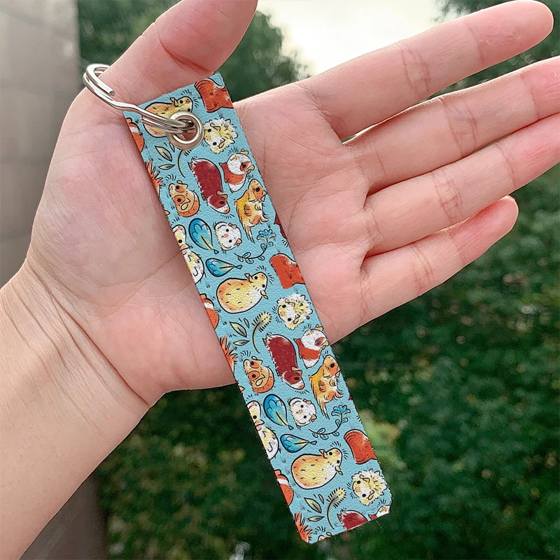 

Fashion zc Guinea Pig Huddle In Blue Keychain Strap Keyrings Hanging Holder Bag Car Wallet Trinket Keychain Hanging